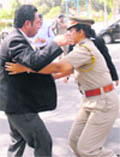 An advocate being stopped by a woman cop from entering the Punjab Police Headquarters during a protest against the Punjab Police in Chandigarh