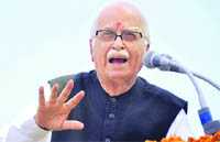 Senior BJP leader LK Advani addresses a party meeting in Dehradun on Monday. 