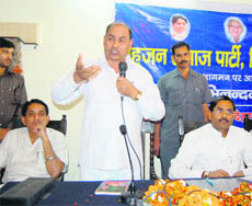 Uttarakhand Bahujan Samaj Party President Dr Megh Raj Singh along with party in charge Ram Achal Rajbar in Dehradun on Monday. 
