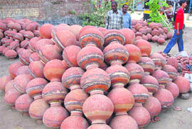 With the mercury soaring, such mounds of earthen pitchers can be seen at various places in Hisar