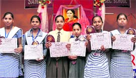 Students with their trophies and certificates in Ludhiana. Tribune photo: Himanshu Mahajan