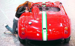 An employee inspects an Alfa Romeo 6C 3000CM ahead of a vintage car trade fair in German city of Essen on Tuesday.