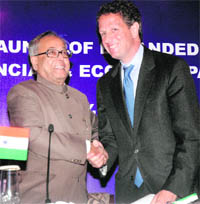 Finance Minister Pranab Mukherjee shakes hands with US Treasury Secretary Timothy F Geithner at a joint press conference to launch the Expanded US-India Financial & Economic Partnership in New Delhi on Tuesday.