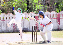 A wicketkeeper jumps to catch the ball at the Central Government Employees Welfare Coordination Committee Cricket Tournament in Dehradun on Tuesday. 
