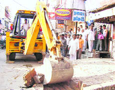 An anti-encroachment drive in progress in Rohtak on Tuesday.