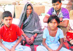 Krishna with her three children outside her relatives house.