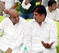Former Haryana Janhit Congress leader Rohtas Khatana with INLD national general secretary Ajay Singh Chautala at a function at Rithaula village in Gurgaon on Tuesday.