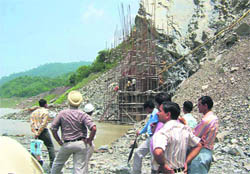 The ill-designed bridge pillar under construction.