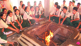 Children participate in the yajna at Swami Mohan Dass Model School in Jalandhar on Tuesday.