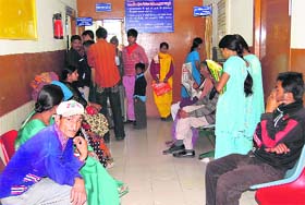 Patients wait at a government hospital in Mussoorie