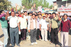 Residents of Dharchula sub-division hold a protest on Wednesday.