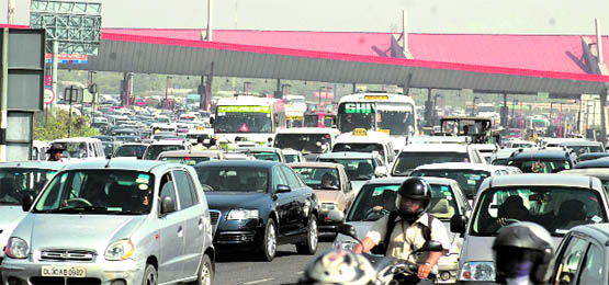 A view of a traffic jam at a toll plaza on the Delhi-Gurgaon highway