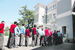 Students from a deaf and dumb school, Dhalli, waiting in a queue for watching Vidhan Sabha proceedings at Shimla