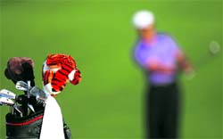 Tiger Woods plays a shot during practice prior to the Masters Tournament at Augusta National Golf Club on Wednesday.  AFP 