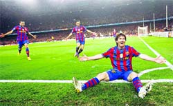 Lionel Messi celebrates his second goal on Tuesday.  AFP