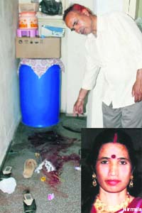 A relative of Nirmala Babbar, who was murdered at her Sector 55 home in Chandigarh, showing the blood stained floor at the victims house