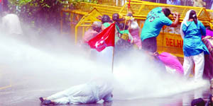 Water cannons used to disperse Left-wing activists at Parliament Street in New Delhi on Thursday.