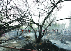 A view of the gutted Ghazipur slum in New Delhi on Thursday.