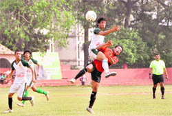 A match in the BS Negi Memorial Football Tournament in progress in Dehradun on Thursday.