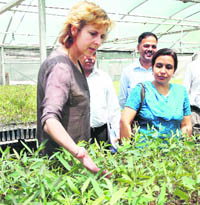 EU climate action commissioner Connie Hedegaard inspects a research station at Seonthi village in Kurukshetra on Thursday.