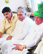 INLD leader Om Prakash Chautala with former minister Kanwal Singh (on his right) at Hisar on Thursday. 