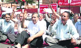 CPM activists stage a dharna in support of their demands in Jammu