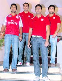 Members of Kings XI Punjab team pose for the shutterbug