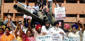 Activists of the joint panel of citizens and former servicemen protest in Amritsar.