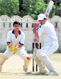 A batsman gets ready to cut the ball in a match of the Central Government Employees Welfare Coordination Committee Cricket Tournament in Dehradun