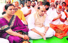 Former BJP chief Rajnath Singh prays at the Bairagi Akhada in Haridwar on Friday.