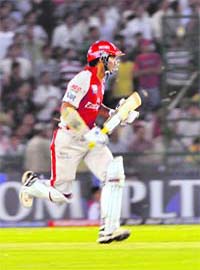 Kings XI Punjabs captain Kumar Sangakkara takes a run at the PCA stadium in Mohali