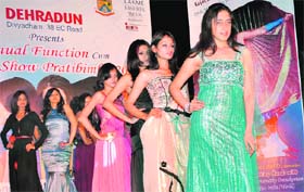 Models walk on the ramp at a fashion show in Dehradun