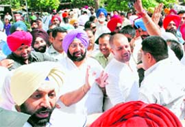 Former CM Amarinder Singh comes out after a court hearing in the City Centre case in Ludhiana on Saturday. A Tribune photograph
