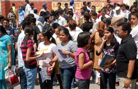 Students outside a joint entrance examination-2010 centre in Bathinda on Sunday. Tribune photo: Pawan Sharma