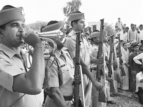 Securitymen pay respects to their colleagues who died in the Maoist attack in Chhattisgarh