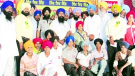 Winners of the turban-tying contest at Pohir village in Ahmedgarh on Sunday. A Tribune photograph
