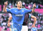 Chelseas Frank Lampard celebrates after scoring against Aston Villa during their FA Cup semifinal at the Wembley stadium in London on Saturday. Chelsea won 3-0.  Reuters