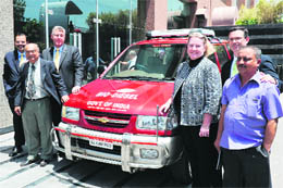 General Motors India MD Karl Slym (3rd from left), Central Salt and Marine Chemicals Research Institute's (CSMCRI) director Pushpito K. Ghosh (2nd from left) along with others, pose with a biofuel-powered Chevrolet Tavera, which runs on biofuel from the jatropha plant, in Ahmedabad on Monday. General Motors said the automaker and the US Department of Energy will partner CSMCRI to manage jatropha farms and explore developing high-yielding varieties of the plant used in the production of bio-diesel. 