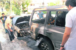The cars of Bhupinder Singh, father of PUSU president, that were burnt at his house in Sector 11, Chandigarh,