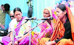 Women singers at a function in Nainital. A Tribune photograph