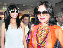 Actress Zeenat Aman (right) and model Kalpana  Malviya during the inauguration of a fashion garment showroom at a mall in Gurgaon on Sunday.