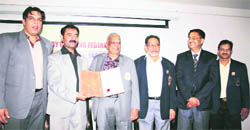 Indian Bodybuilding Federation director Amit Swami with the award at Amravati