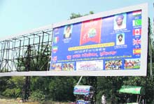 An illegal advertisement of the World Cup kabaddi final put up on the hoarding owned by the forest department. 