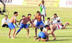 Kabaddi players in action at the Guru Nanak Stadium in Ludhiana. 