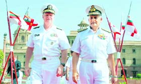 Walking the red carpet: Navy chief Admiral Nirmal Verma and his US counterpart Admiral Dary Roughead (L) inspect a guard of honour in New Delhi