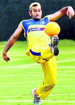 Chennai Super Kings skipper MS Dhoni during a practice session at MAC Stadium in Chennai on Monday.  PTI