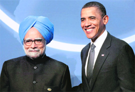 US President Barack Obama greets Prime Minister Manmohan Singh during an official welcome ceremony for the Nuclear Security Summit at Washington DC.