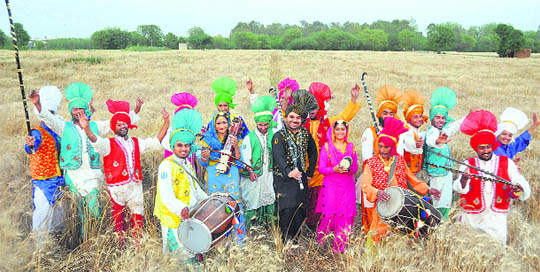 A bhangra troupe celebrates Baisakhi with traditional fervour near a village in Ludhiana
