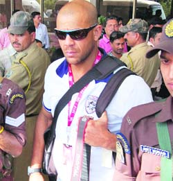 Deccan Chargers Andrew Symonds arrives at the Kangra airport on Tuesday.