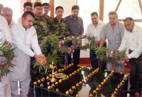 Armymen, War Memorial Committee members and family members of the martyrs paying tributes at the Four Jat Regiment Memorial at Asafwala in Fazilka